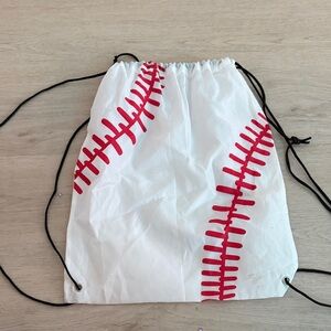 White Drawstring Backpack with Red Baseball Stitch Design